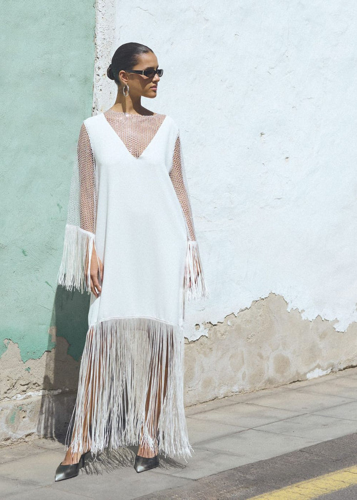 Dress with mesh and tassels