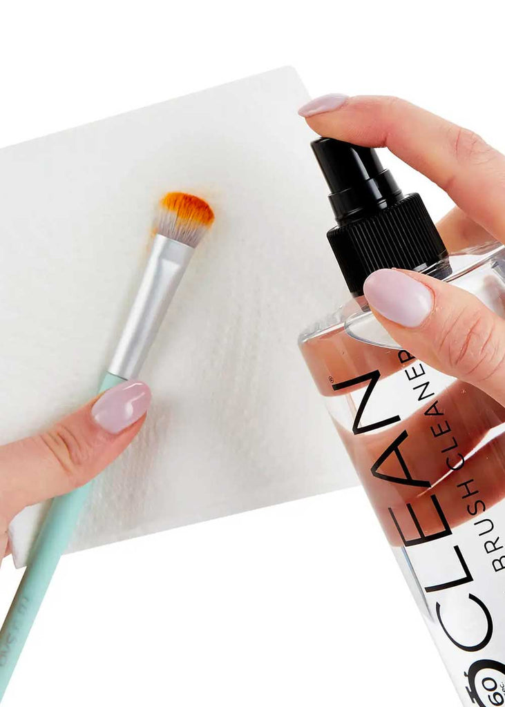 Spray ISOCLEAN Makeup Brush Cleaner onto dirty brush.